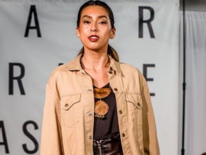 Image of woman wearing ethical fashion at an ethical fashion show.