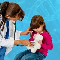 A doctor examines a child's teddy bear