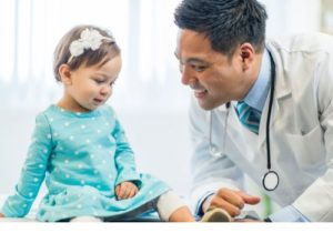 doctor smiling at a child