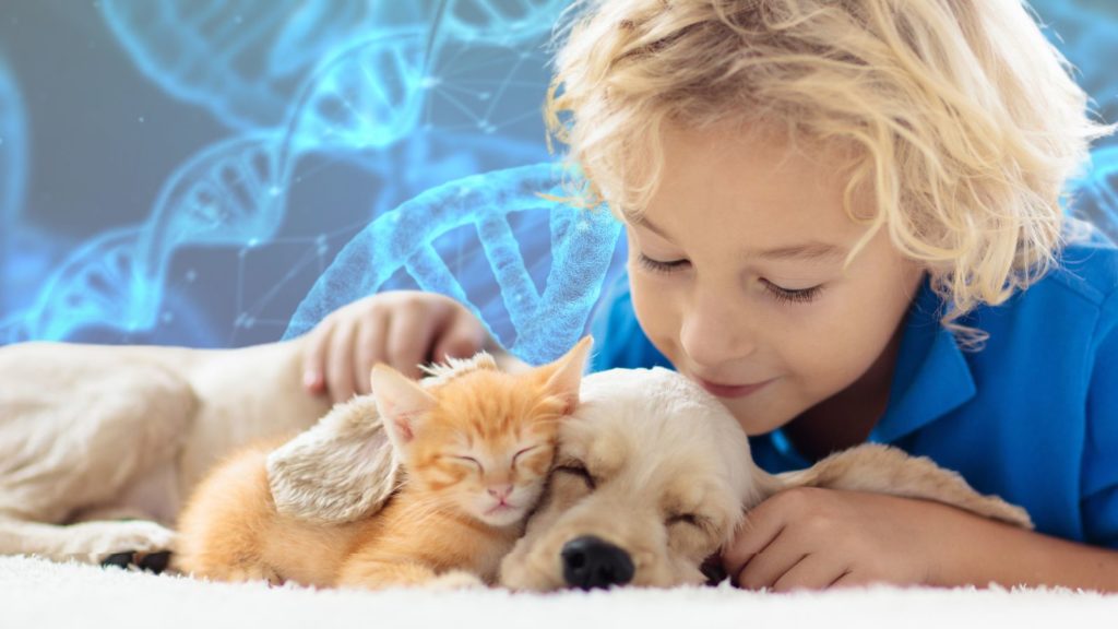 Image of child snuggling a dog and kitten with dna strands in the background